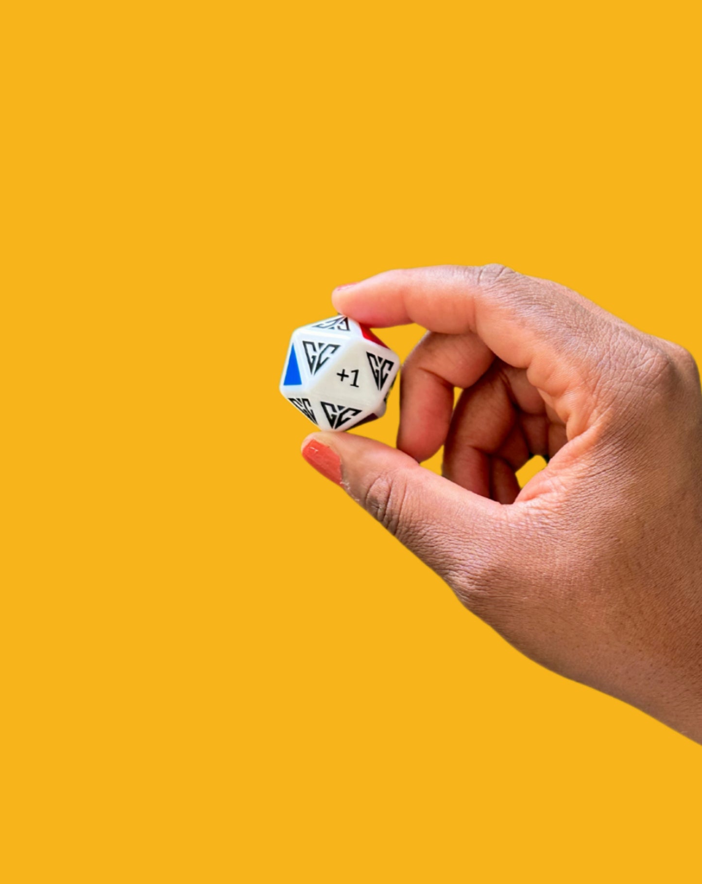 Hand holding Parham & Co. family game night dice with colorful symbols for fun gameplay