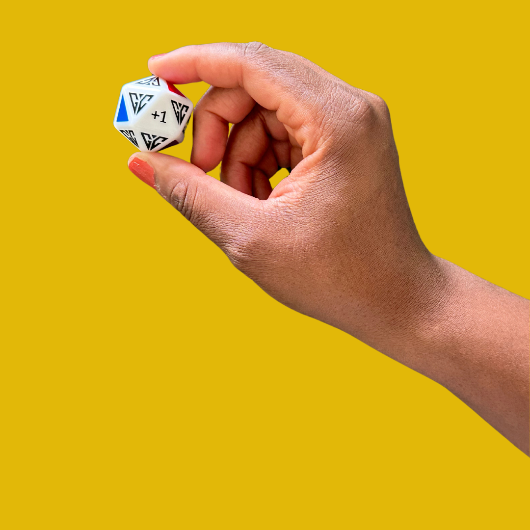 Colorful dice in hand for Parham & Co family dice games, perfect for family fun and bonding